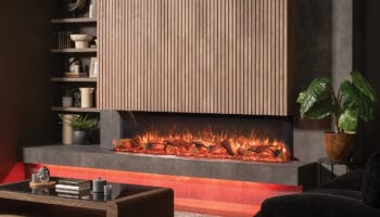 Onyx Avanti 190RW installed as a three sided fire, wood slatted wall about fire. Mocha walls modern liging room decor with ambient lighting around hearth