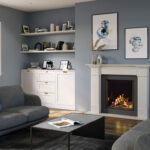 Onyx Eclipse 60HL gas fire with white mantel, light blue walls, and wood flooring.